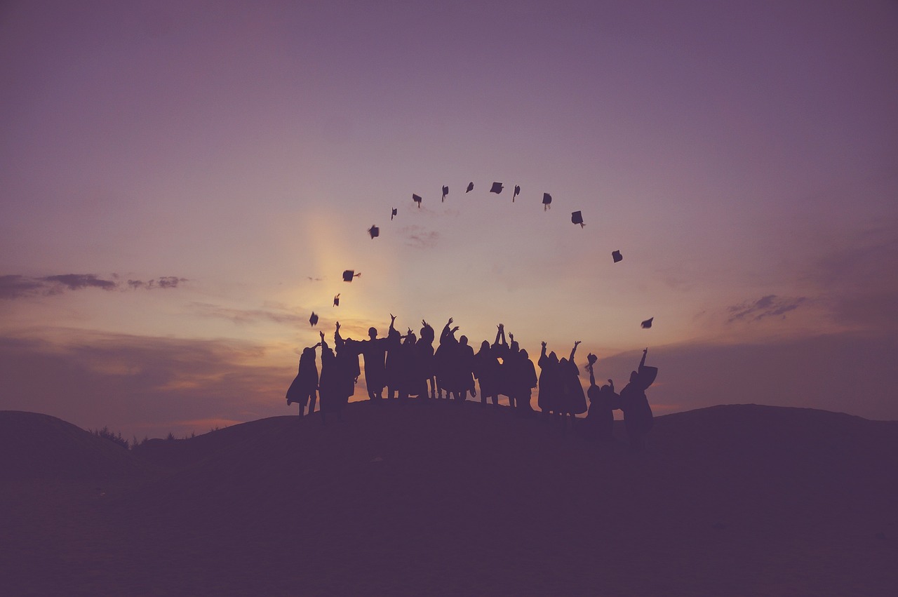 Image of Us from https://pixabay.com/photos/dawn-graduates-throwing-hats-dusk-1840298/